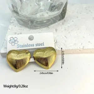 Detailed view of gold stainless steel striped heart earrings with size and weight labels
