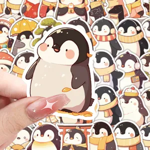 Close-up detail of cute cartoon penguin sticker design, perfect for journal and water bottle decor.