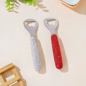 Detail of rhinestone stainless steel bottle openers in silver and red sparkling finishes.