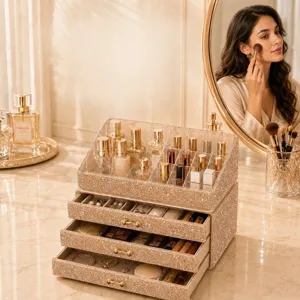 Luxury three-tier sparkling rhinestone jewelry and makeup organizer on a marble vanity top