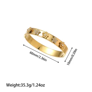 Detailed dimensions and weight of a gold-toned flower patterned stainless steel bangle.
