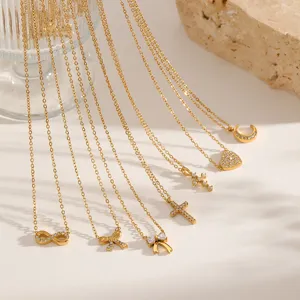 Elegant gold crystal pendant necklaces featuring heart moon bow and cross designs
