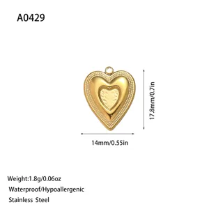 Gold heart-shaped stainless steel pendant with detailed textured edges and specifications.