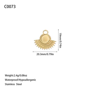 Detail view of gold fan-shaped stainless steel pendant with size and weight specs