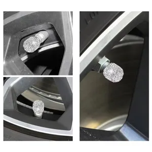 Rhinestone car tire valve caps detail view showing sparkling crystal design installed on wheel.