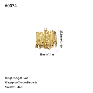 Macro view of gold-plated textured stainless steel pendant showing dimensions and weight info