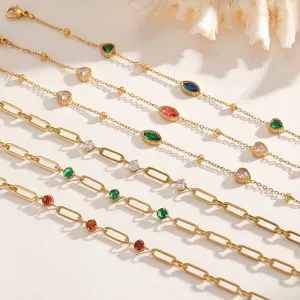 Elegante conjunto de pulseras de acero de titanio dorado con piedras de circón de colores