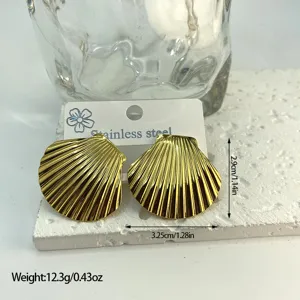 Macro view of gold seashell earrings in stainless steel with dimension and weight info