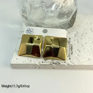 Close-up detail of gold geometric square stud earrings with 1 inch size and weight