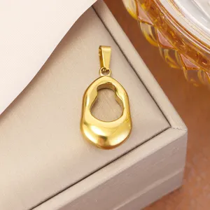 Detailed view of an irregular hollow teardrop gold titanium steel pendant accessory