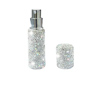 Portable 10ml rhinestone perfume atomizer travel spray bottle for daily use and cosmetics.