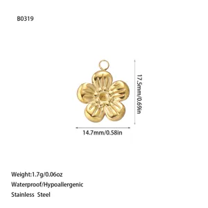 Detailed view of a golden stainless steel flower charm with size and weight markings