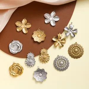 Assorted stainless steel flower charms in gold and silver finishes for jewelry making