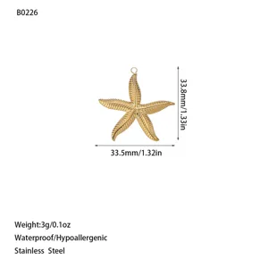 Dettaglio pendente stella marina in acciaio inox oro con dimensioni e peso