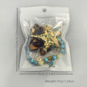 Detailed view of beach luminous star jewelry set with packaging dimensions 12x9cm