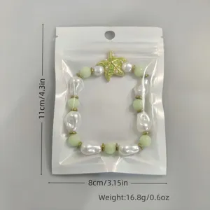 Detailweergave van lichtgevende zeester accessoire met afmetingen en gewicht