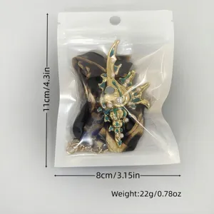 Luminous conch shell pendant necklace inside packaging with dimension specifications