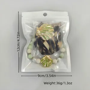 Luminous shell necklace in clear zip-lock bag with 12x9cm size and 36g weight specs
