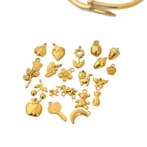 Assorted golden stainless steel DIY charms and jewelry pendants for handmade crafts.
