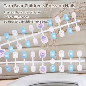 Detail view of cute blue and purple bear-themed press-on nails for kids, 30pcs.