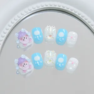 Handmade cute bear press-on nails with blue and white bow-knot charms
