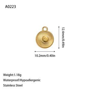 Detailed view of a gold sunburst stainless steel charm with dimensions and weight specs