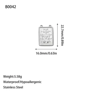 Detailed view of a rectangular stainless steel religious pendant with size measurements