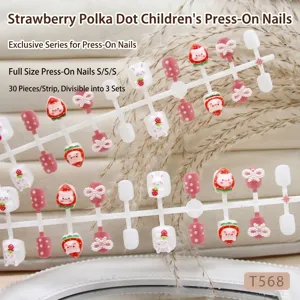 Macro view of 30pcs children's press-on nails with cute rabbit and strawberry patterns.