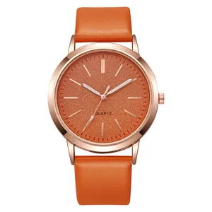 Detailansicht Damen-Quarzuhr mit orangefarbenem Glitzerzifferblatt und PU-Band