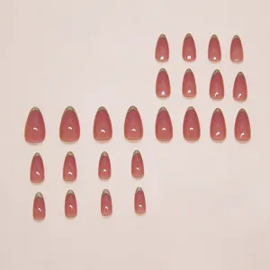 Detailed layout of 24pcs nude press-on nails with elegant gold glitter French tips.