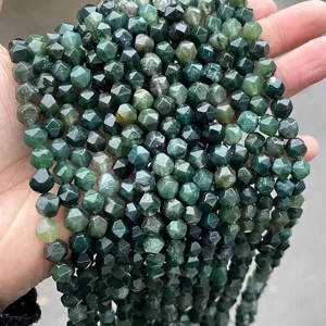 Macro view of dark green faceted moss agate beads for DIY jewelry projects