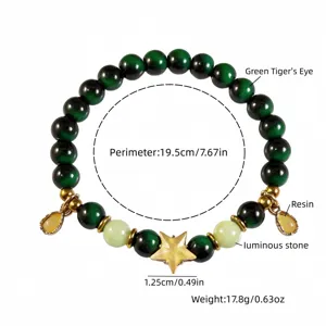 Green tiger's eye beaded bracelet featuring luminous stone star charm and size details