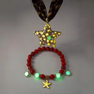 Glow in the dark pentagram necklace and starfish beaded bracelet with leopard print ribbon