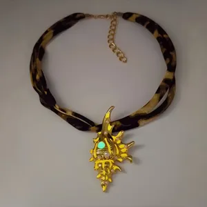 Luminous conch pendant necklace with leopard print cord and pearl accents for women