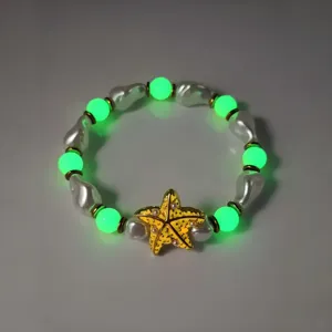 Lichtgevende zeester armband met groene kralen en parels voor strandvakantie stijl