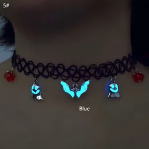 Detailed view of Halloween luminous choker featuring blue glowing ghost and bat charms