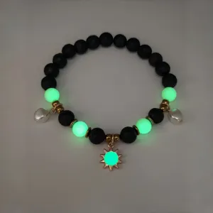 Luminous summer beach necklace with glowing green beads and gold-plated sun charm.