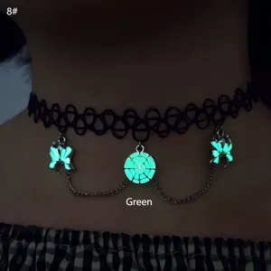 Noctilucent spider web choker with glowing green butterfly pendants for Halloween
