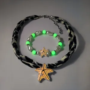 Lichtgevende zeester ketting en parelarmband set met glow-in-the-dark kralen strand