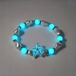 Lichtgevende blauwe zeester armband met parels voor een trendy strandvakantie
