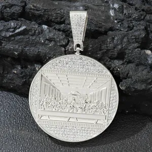 Detail of silver hip-hop round pendant featuring The Last Supper relief with CZ stones.