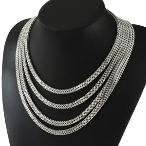 Close-up of double-row stainless steel Franco chain necklace with shiny silver finish