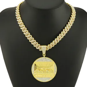 Detailed view of gold Cuban link chain with 3D Last Supper pendant for hip hop style