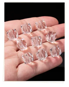 Macro detail of clear faceted natural white crystal cube beads for DIY jewelry making