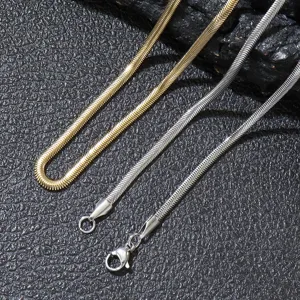 Close-up detail of 3mm wide stainless steel flat snake bone chain texture and clasp