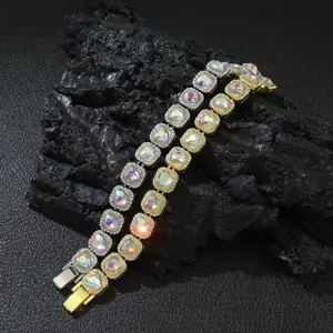 Macro shot of gold and silver hip-hop sugar bracelets with heart rainbow crystals