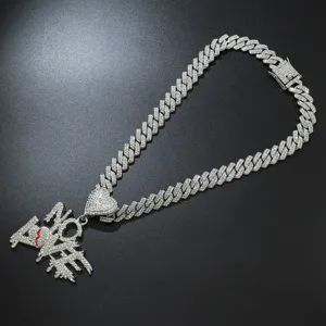 Detailed macro shot of iced out Cuban link chain with NO LOVE broken heart pendant