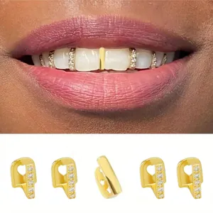 Vista dettagliata del set di grill per denti in oro hip hop fai-da-te e effetto d'uso.