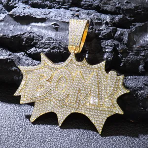 Macro view of hip hop style iced out BOM! pendant with sparkling clear rhinestones