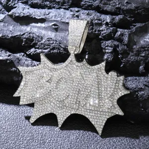 Close-up of hip-hop style 'BOM!' explosion pendant with full rhinestone setting